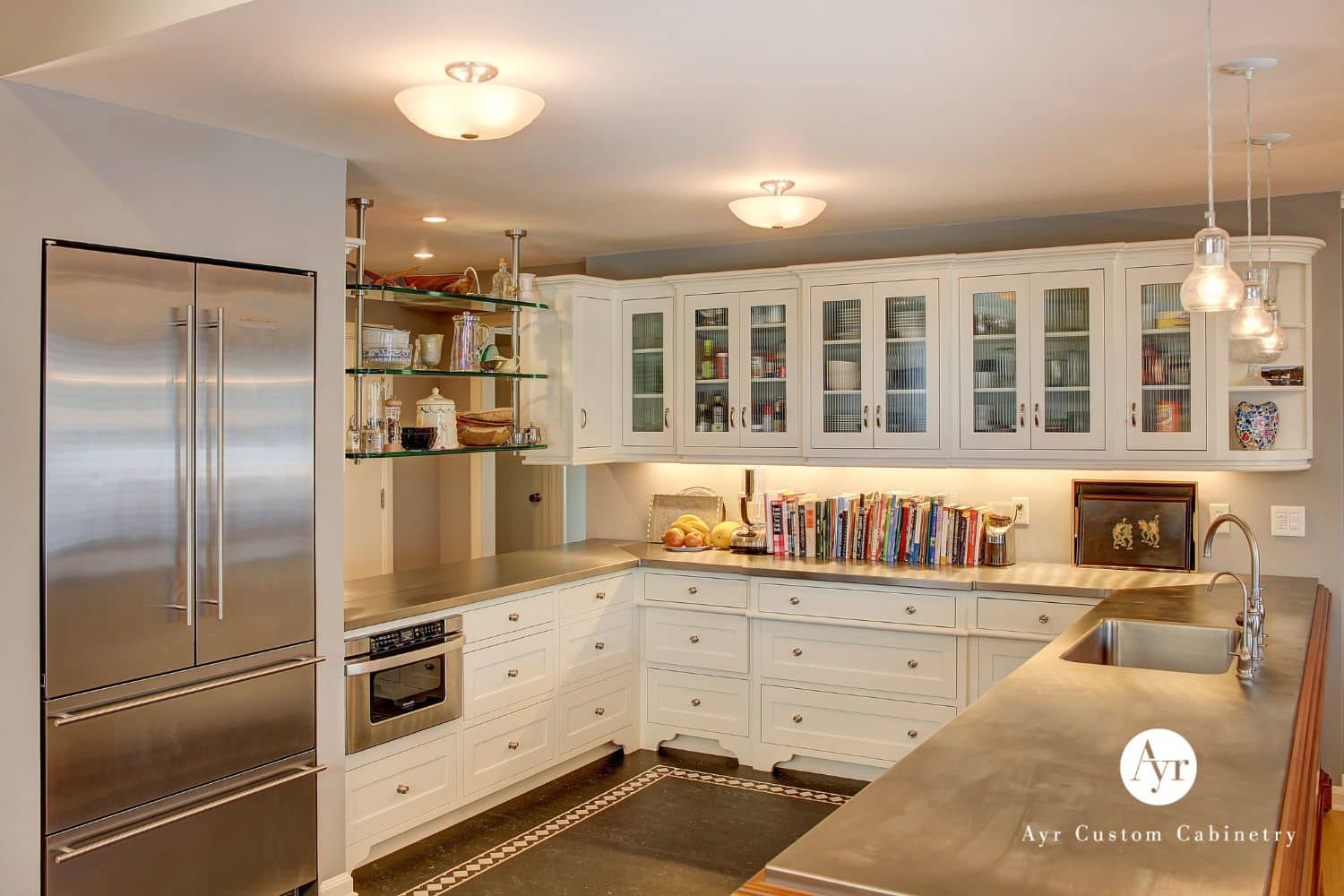 Custom glass paneled cabinets inside custom kitchen in South Bend