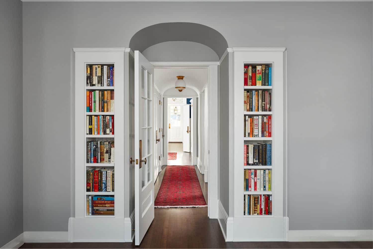 Built in bookshelves alongside hallway in evanston IL