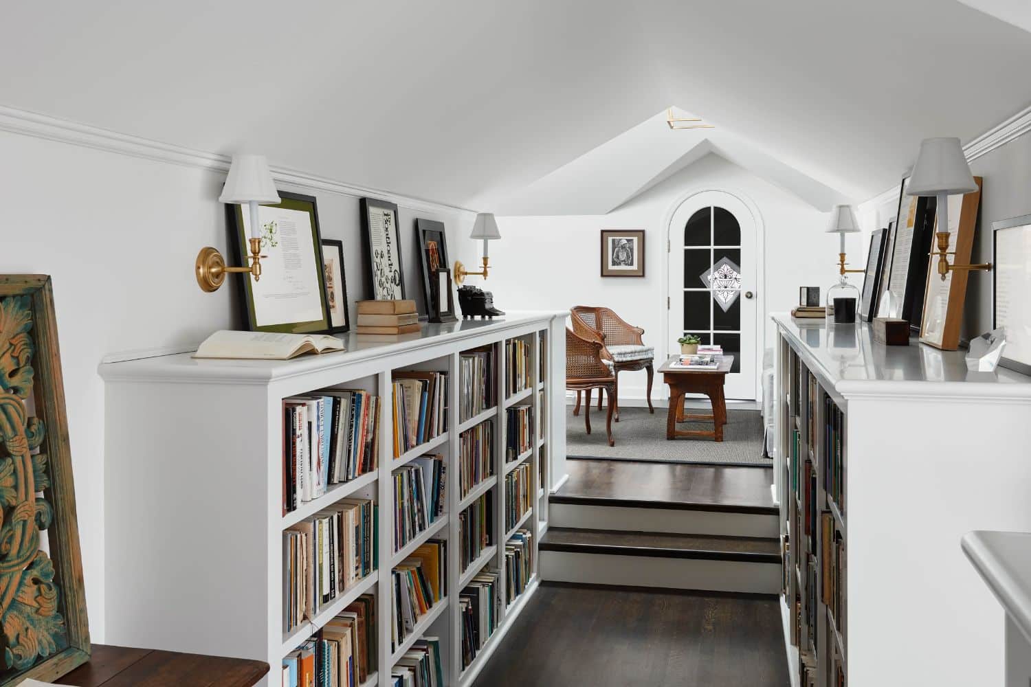 Custom library shelves in hallway with seating area in Evanston IL