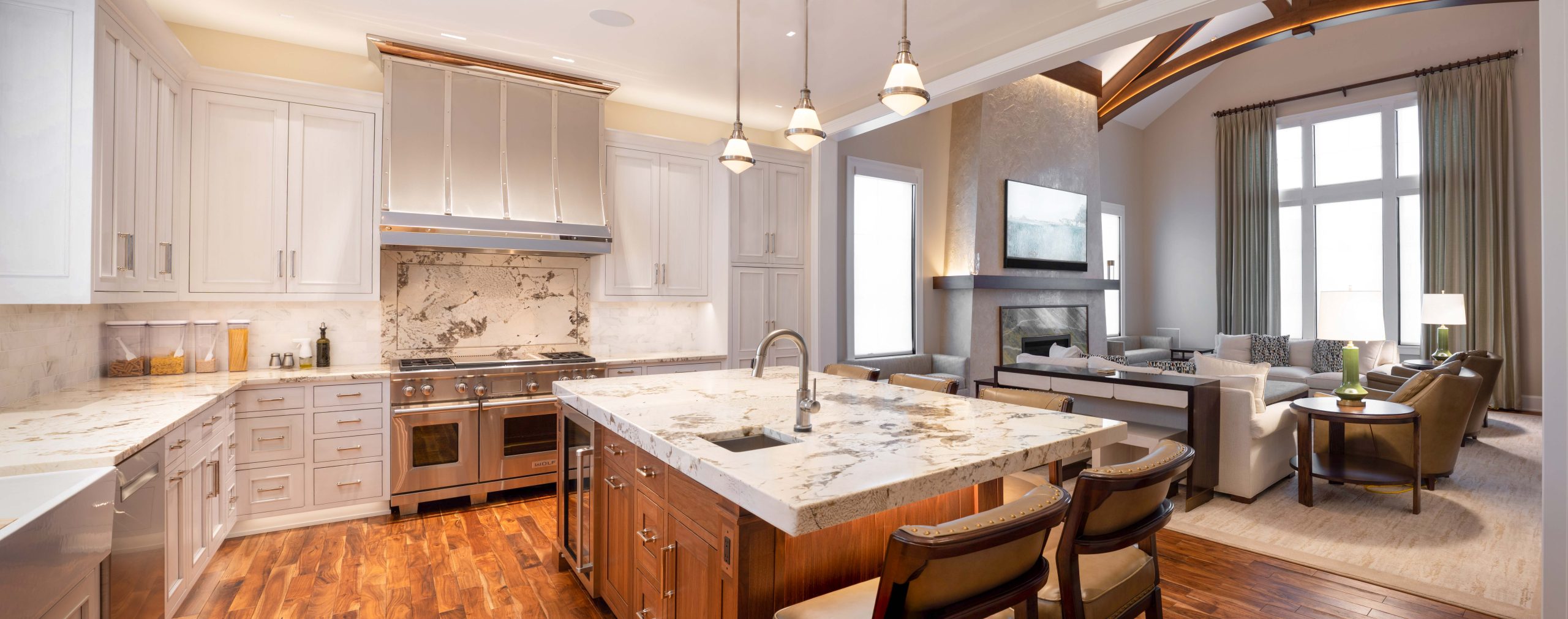 Grey inset kitchen cabinets with marble countertop