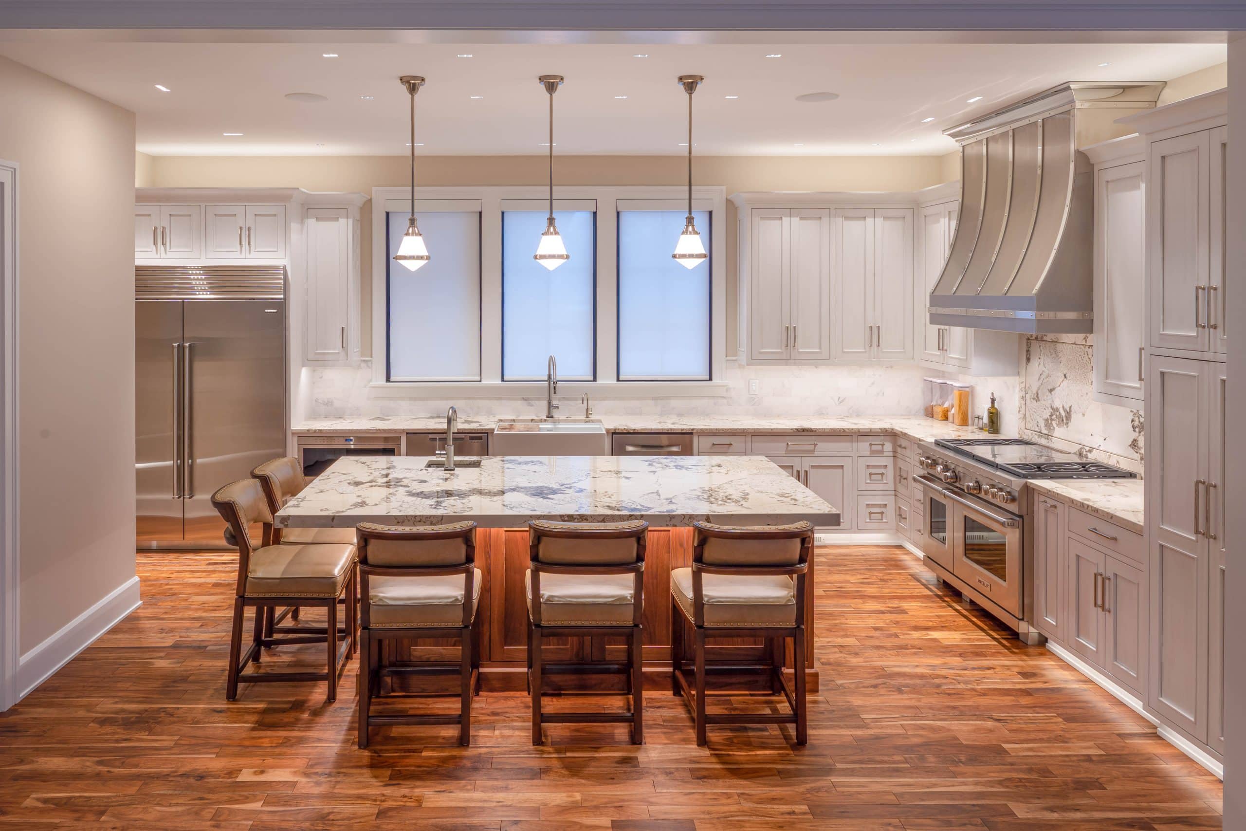 Side view wide shot of kitchen with grey inset kitchen cabinets