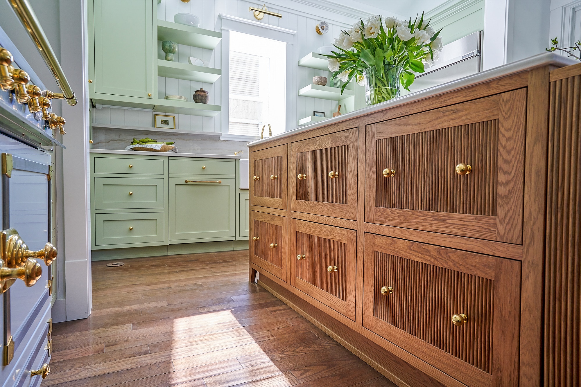 light green cabinets and natural wood island in evanston