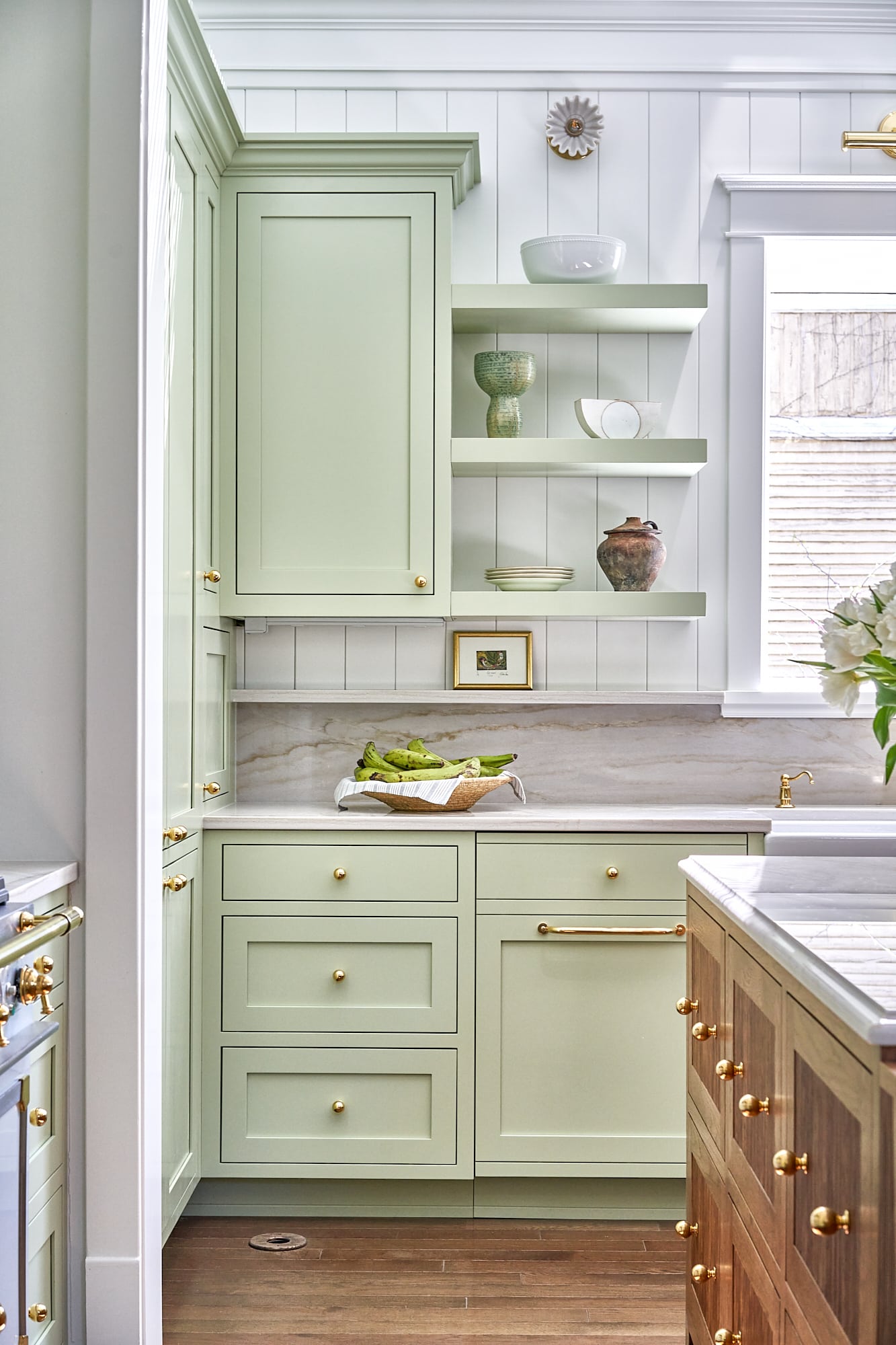 light green cabinets with hardwood floors