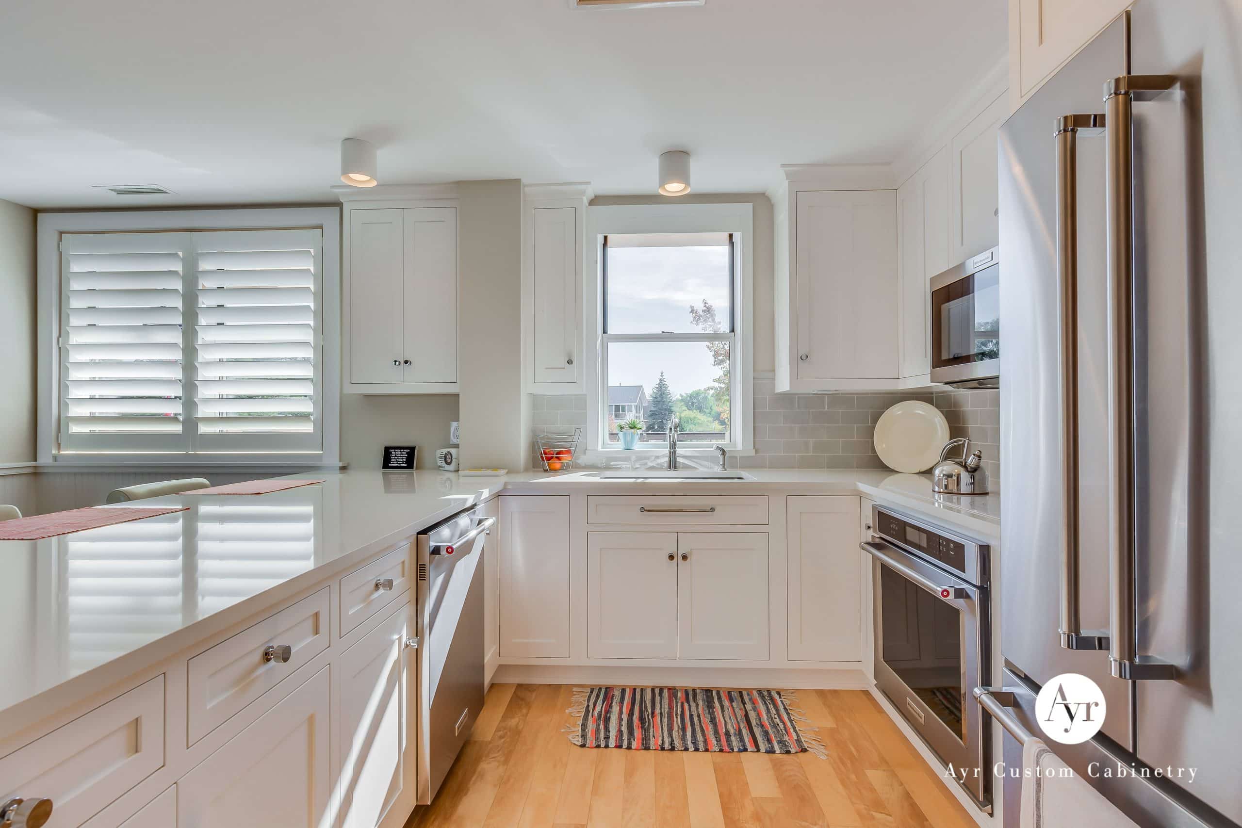 classy white custom kitchen cabinets