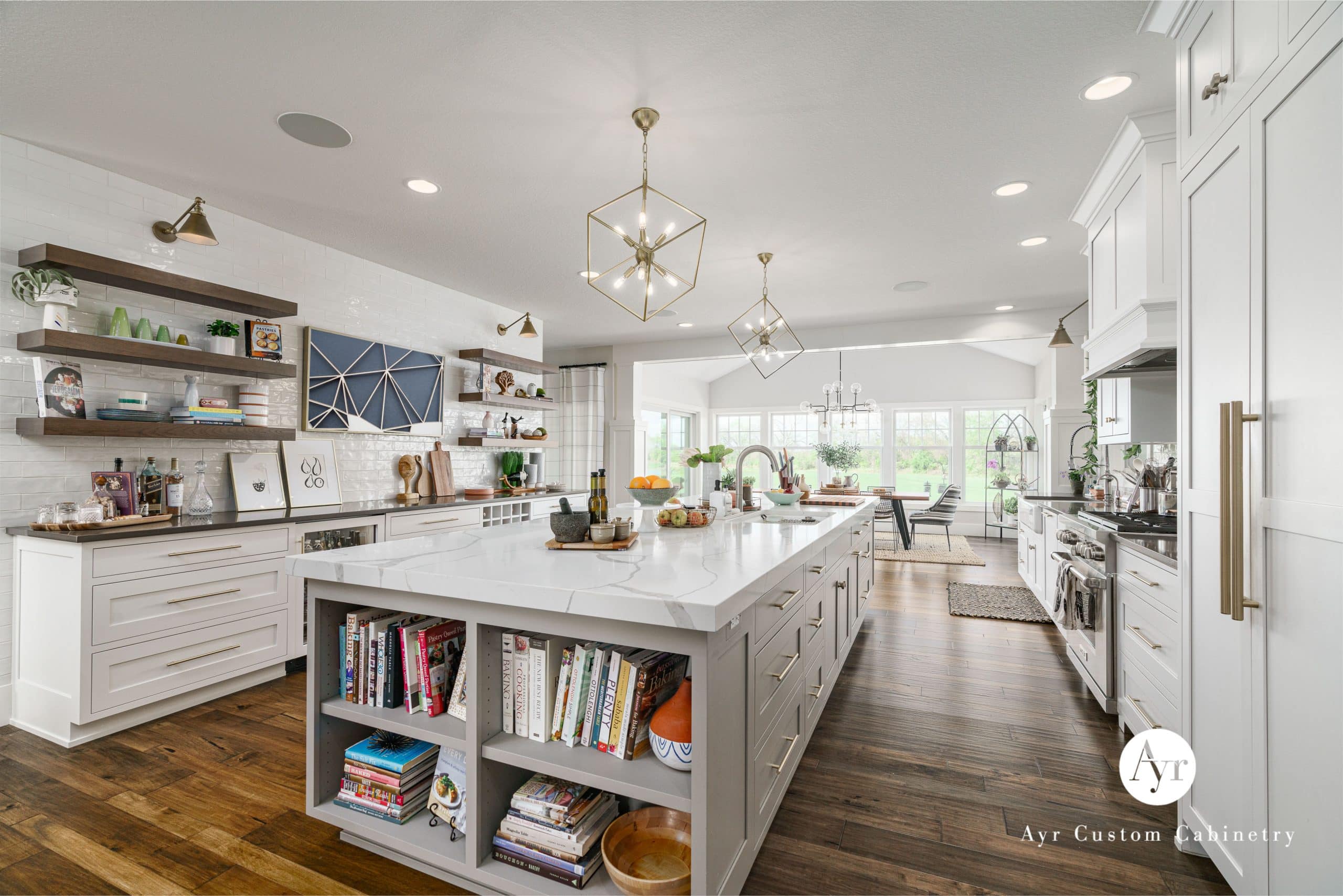 white kitchen with an island in wakarusa