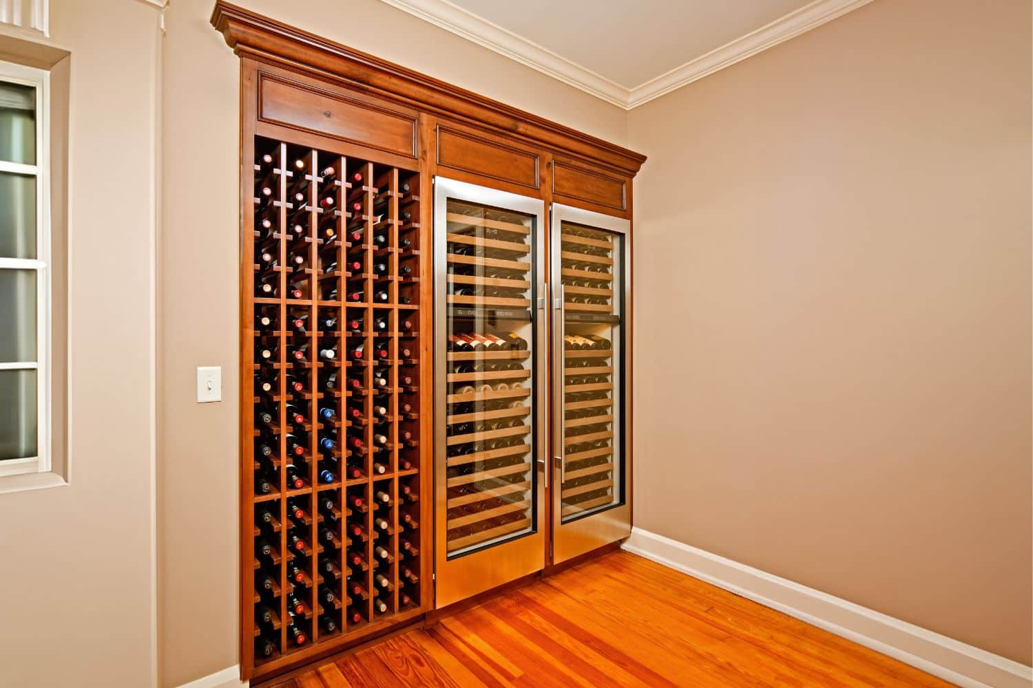 View of wine rack and fridge custom cabinets in South Bend IN